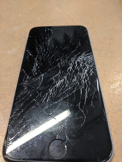 A phone with a cracked screen