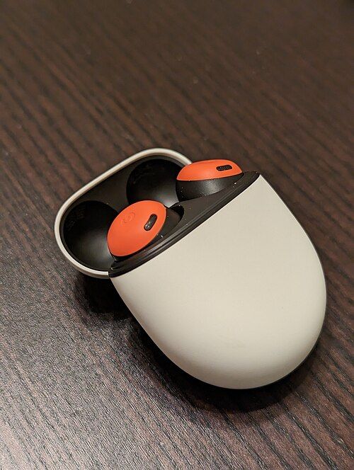 Wireless earbuds in a charging case